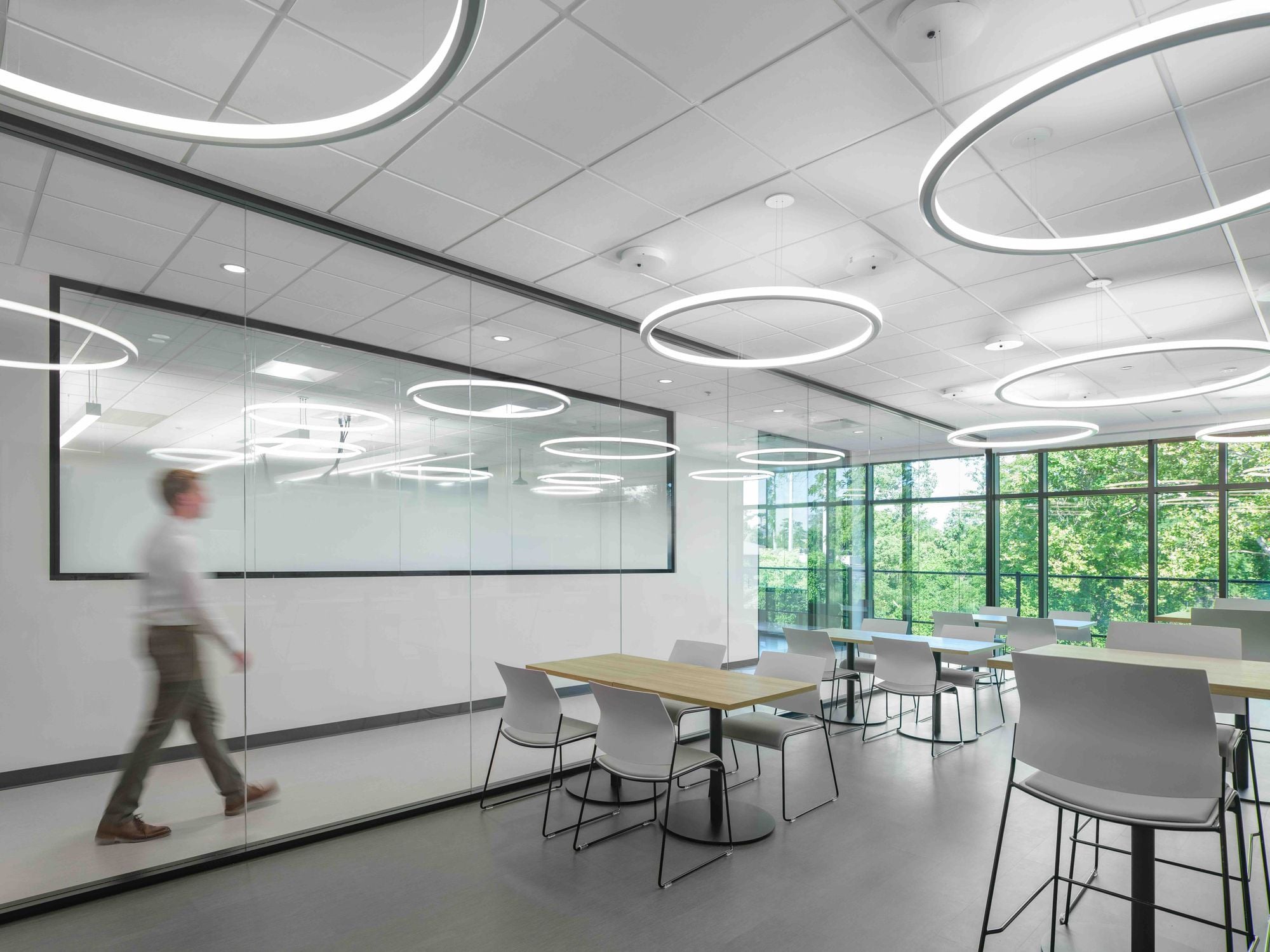 Office space planning - image of a man walking through an office